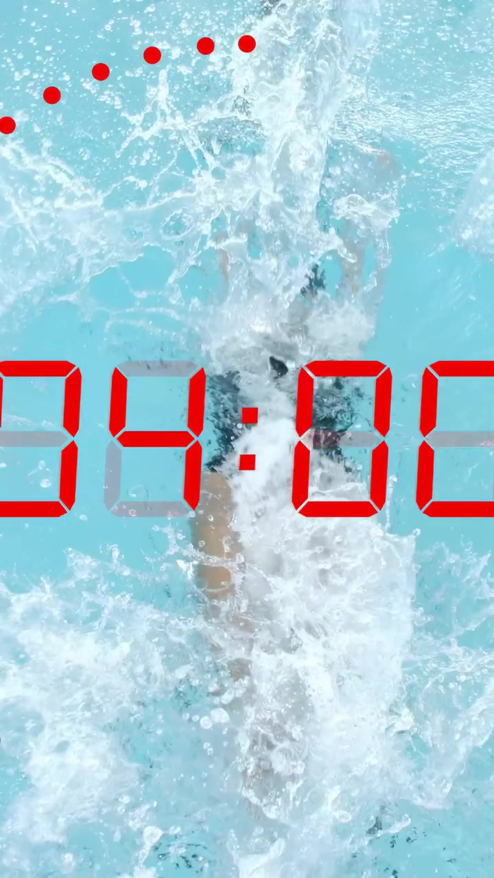 Vertical video: Woman bracing swim timer urging launch gliding under while red dot overlay counting