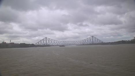 Howrah Bridge from Central Ganges River during rains