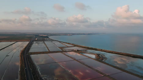 Beautiful-drone-shot-over-salt-red-lakes-in-Bulgaria-near-highway