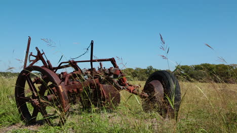 a rusty tractor on a farm in rural america