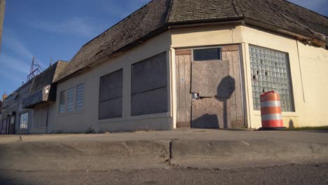 low angle dolly shot of a abandoned business on east side of detroit