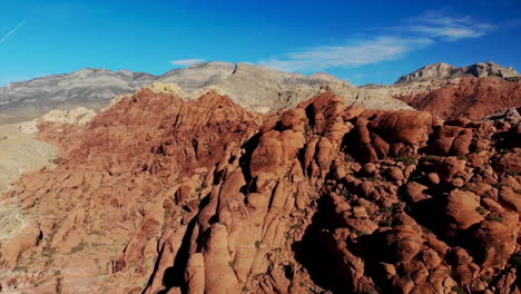 Aerial-drone-views-of-red-sandstone-mountains-at-Red-Rock-Canyon-Park-near-Las-Vegas,-Nevada