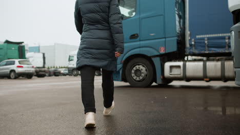 truck driver getting in truck