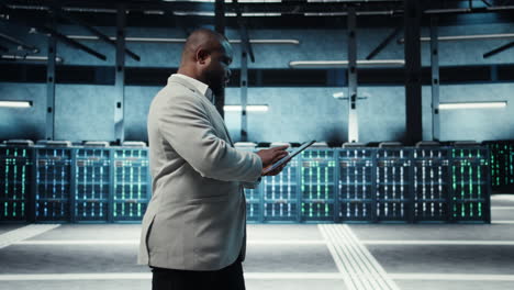 vertical video data center engineer adjusting blade server hardware