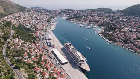 Dubrovnik,-Croatia:-Aerial-of-port,-cruise-ship,-and-historic-cityscape