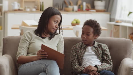 mother and son discussing