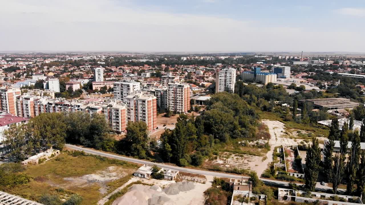 Slow motion cinematic color graded footage of town building by the river