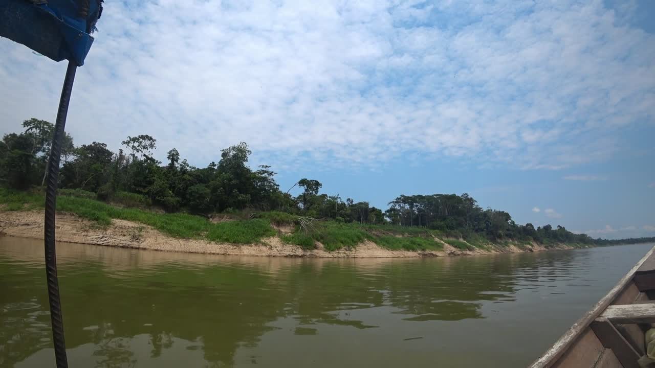 on a small boat in the amazon