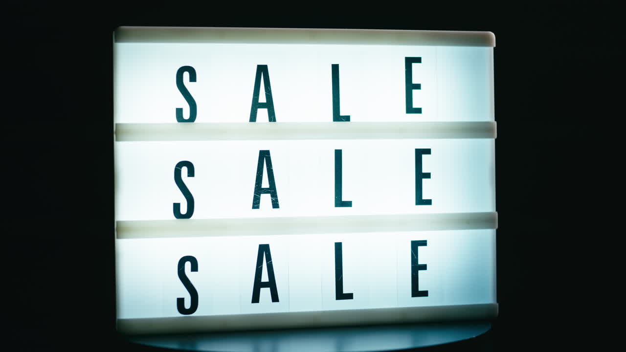 Sale sign circulating in a store before the Black Friday discounts period