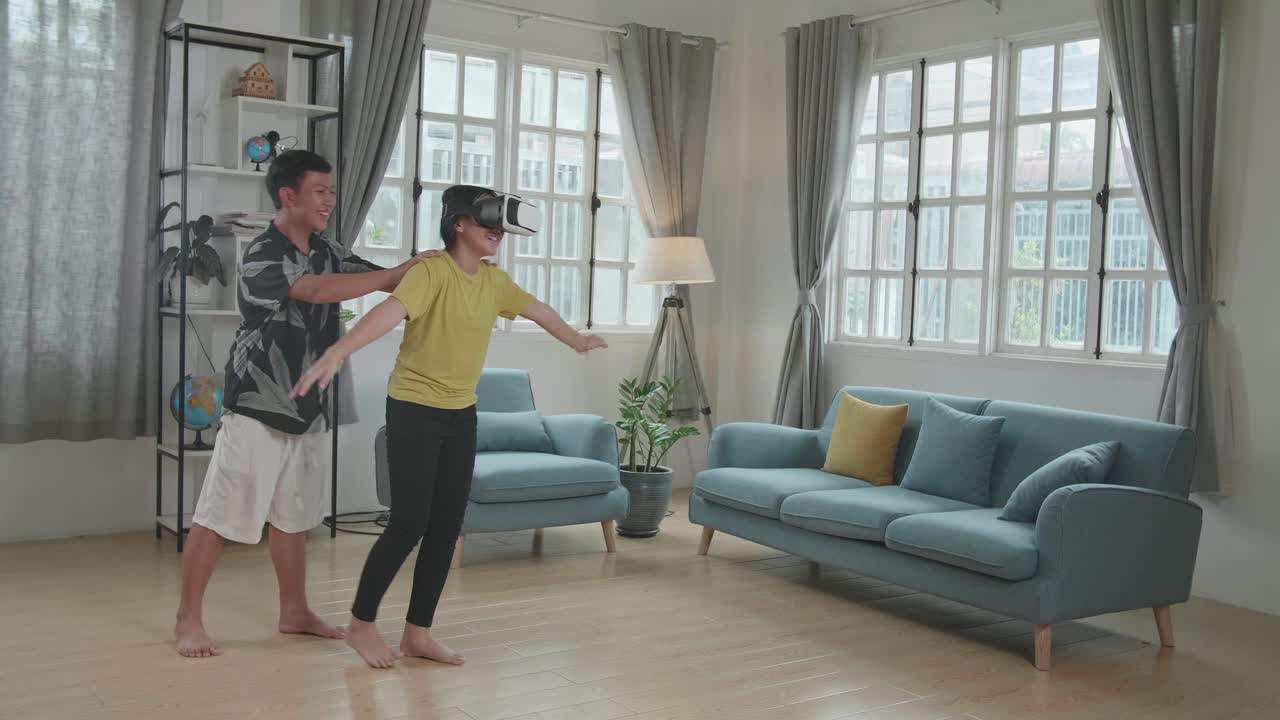 Father and Daughter Enjoying VR Experience at Home