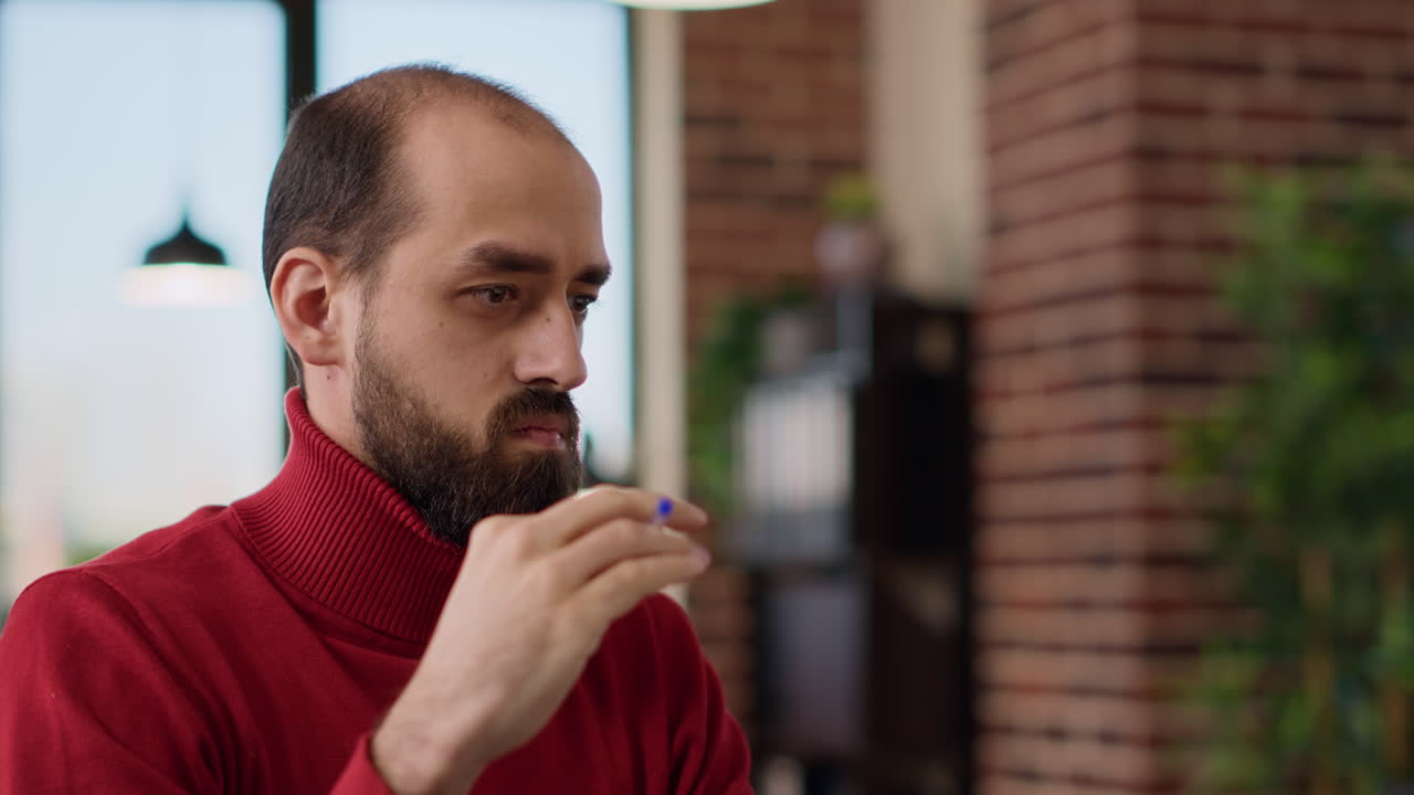 Puzzled male employee brainstorming ideas about business growth