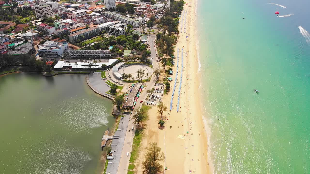 bird's-eye view of tropical beach, long strip of sand and clear seawater, Phuket