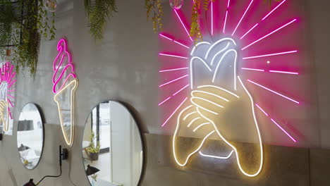 Neon Sign Decorated Wall in a Cafe