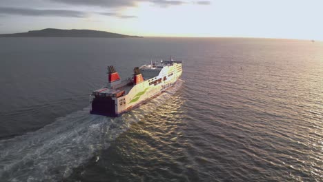 drone shot of cruise ship sailing.
