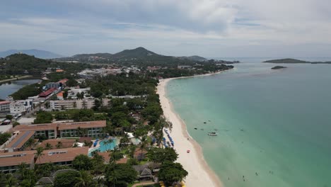 Aerial-shot-of-beach-and-coastal-city-