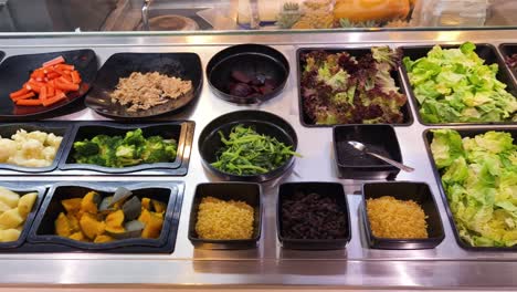 salad bar with various ingredients
