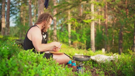 portrait of a man with dog camping outdoor