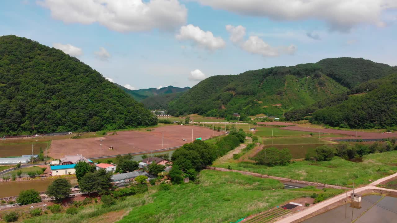 Aerial fly in towards mountains