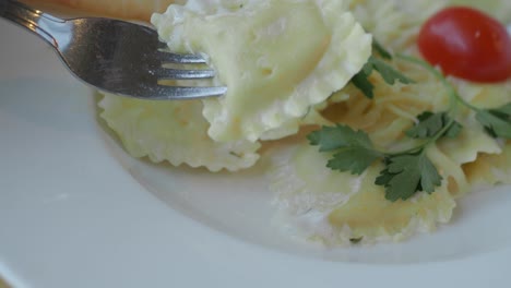 delicious raviolis with cream sauce