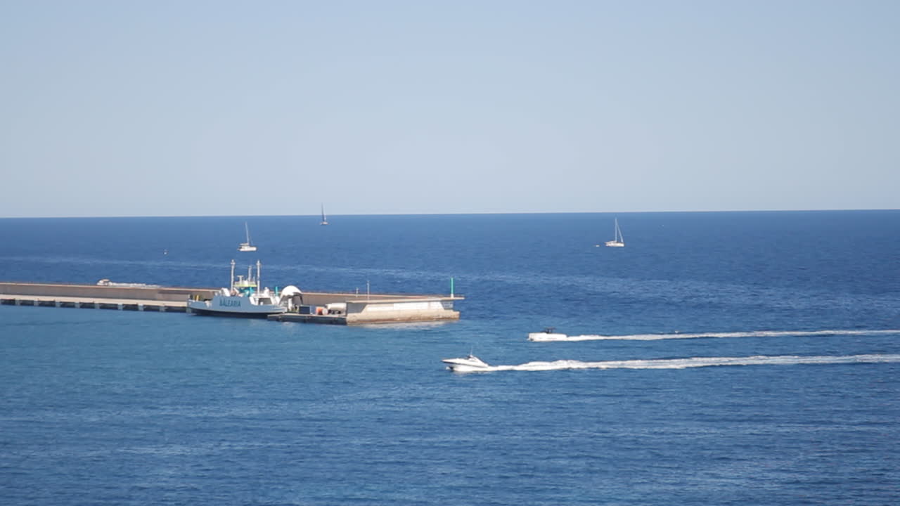 Scenic Coastal View with Boats and Pier