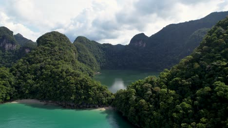 beautiful dayang bunting lake in malaysia, cinematic drone push in shot