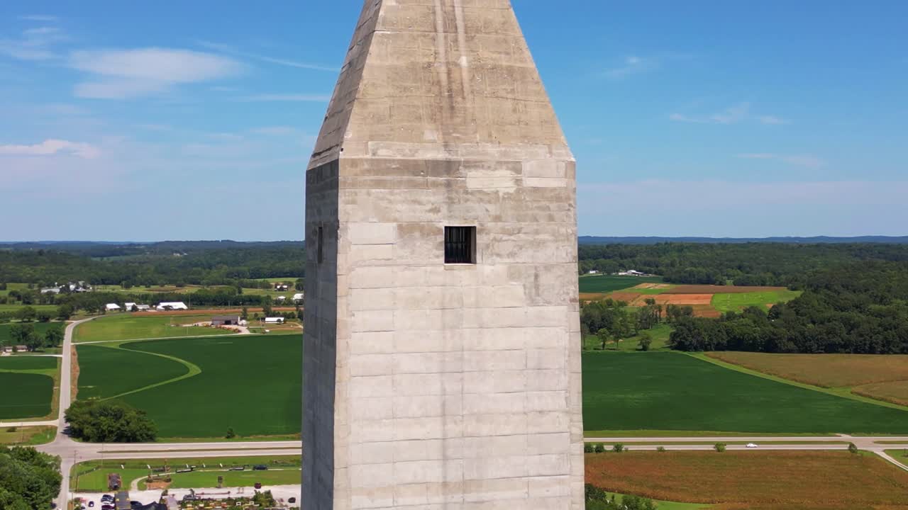 Aerial close up orbit of the Jefferson Davis Monument, located in Fairview, Kentucky