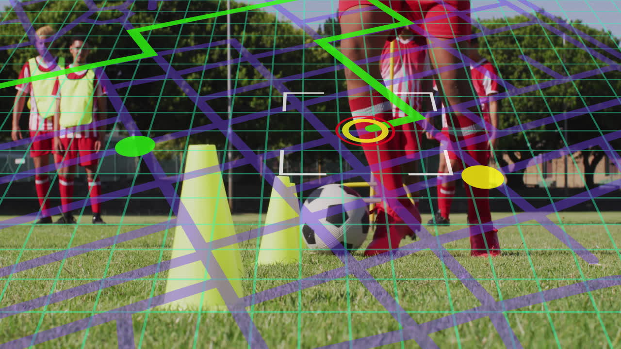 Team performing soccer drill on grassy pitch, showing tracking technology with AR grid on ball