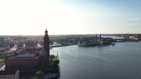 amazing aerial cityscape of historic old town and city hall tower on riverfront