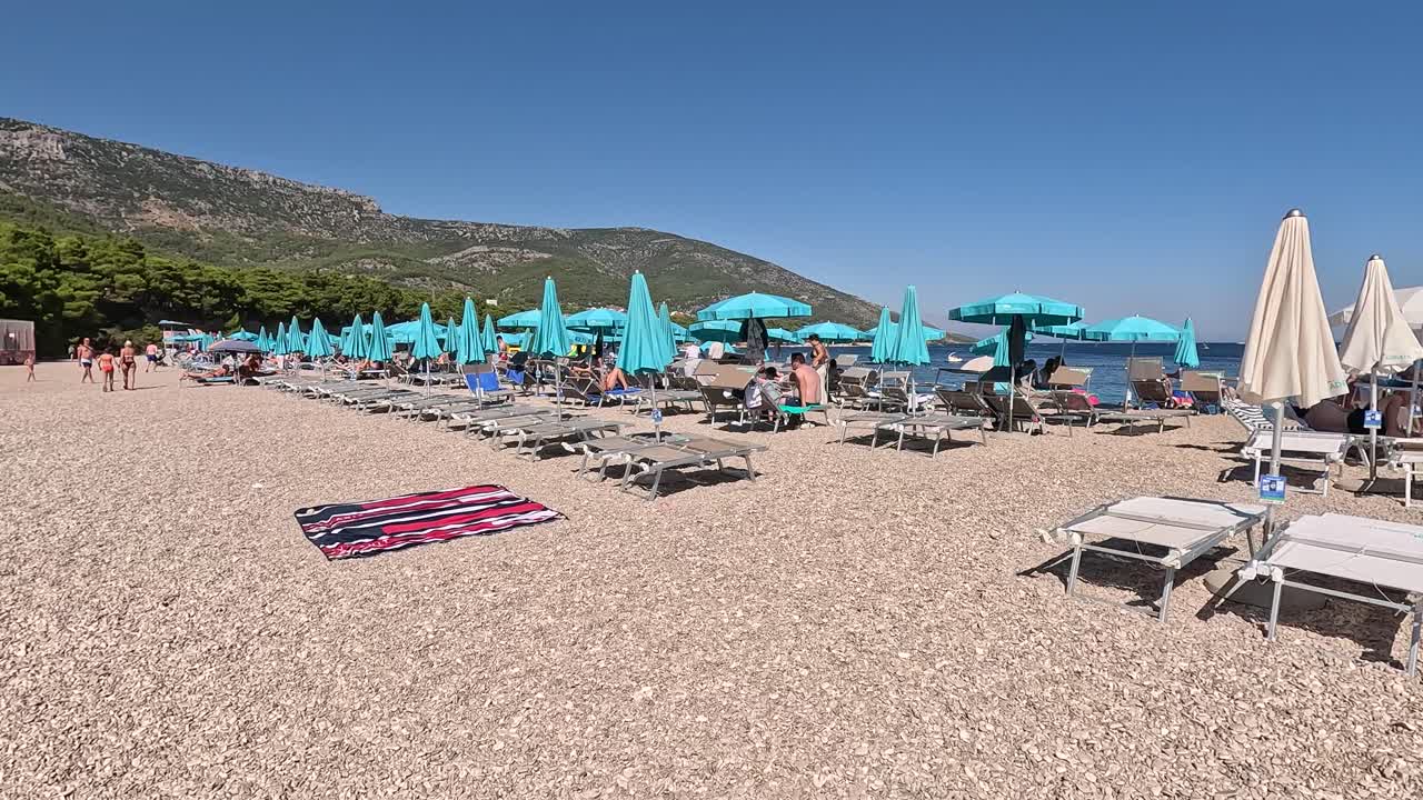 Bol Croatia July 30, 2024 View of the Zlatni Rat Beach on Brac Island, Split Dalmatia, in Croatia. Summer Vacation Resort Golden Cape or Golden Horn. Summertime. Famous Adriatic Beach on Adriatic Sea