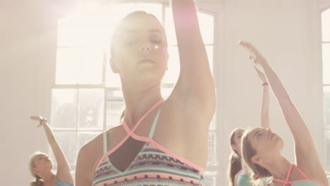 Yoga-class-multi-racial-group-of-women-exercising-fitness-healthy-lifestyle