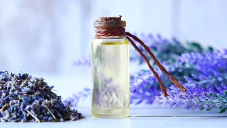 lavender essential oil and dried lavender flowers