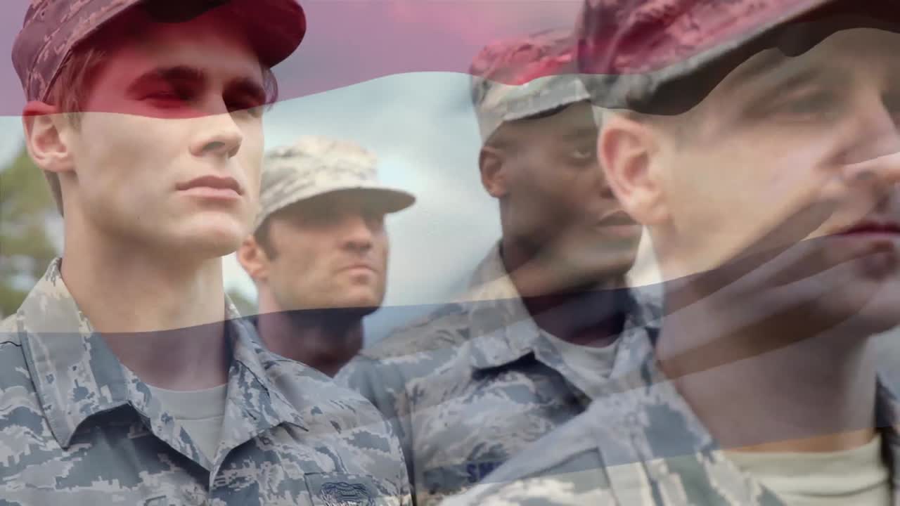 animación de la bandera de los países bajos sobre varios soldados varones