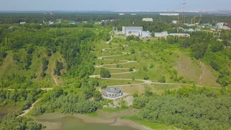 landscape with green hill and round building bird eye view