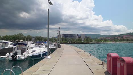 stunning hd footage of various boats and saliboats docked in koper's marina in slovenia