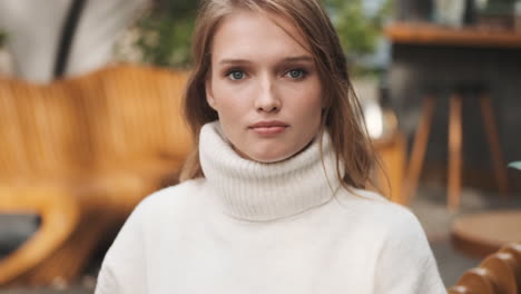 caucasian woman looking at the camera.