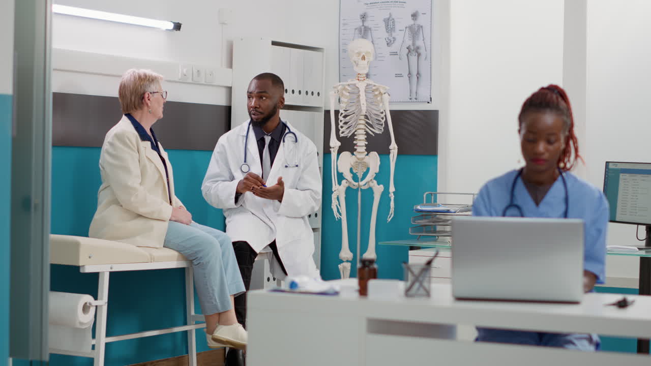 Doctor consulting with patient in clinic