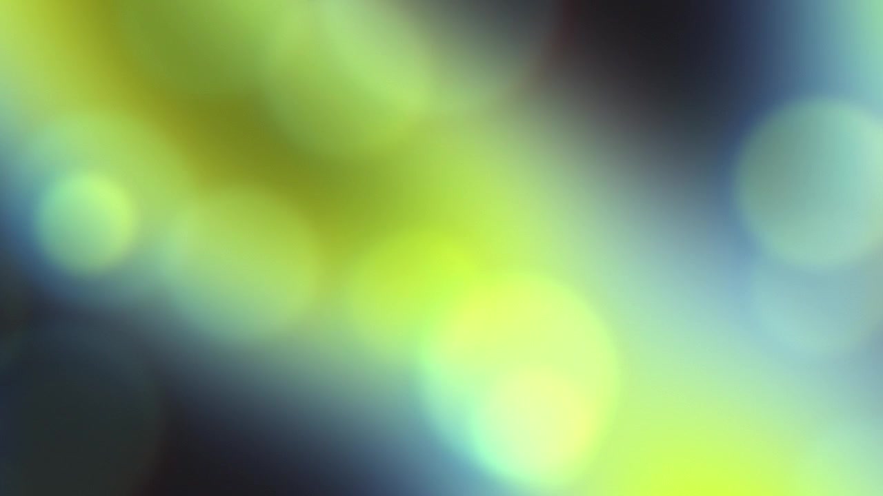 Abstract Background with Soft Glowing Green and Blue Bokeh Lights