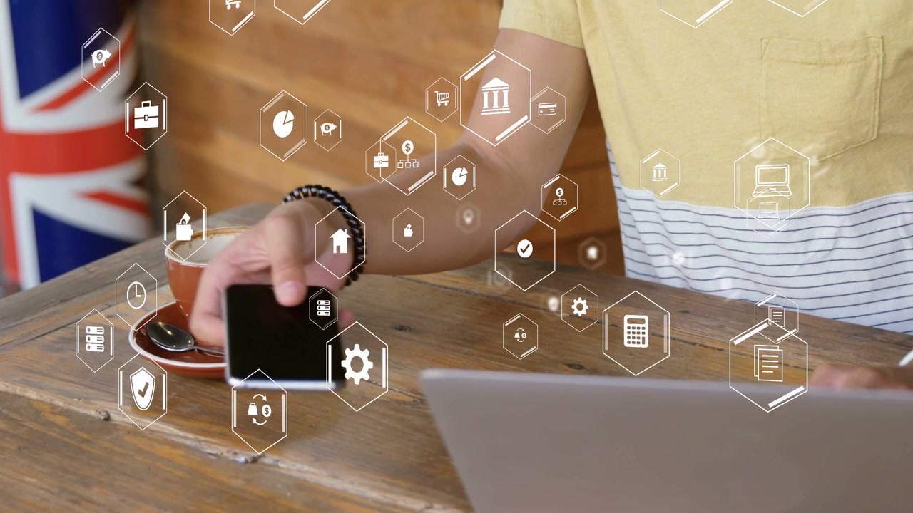 Man sitting cafe table, tapping smartphone and showing hex icons over hands while managing business