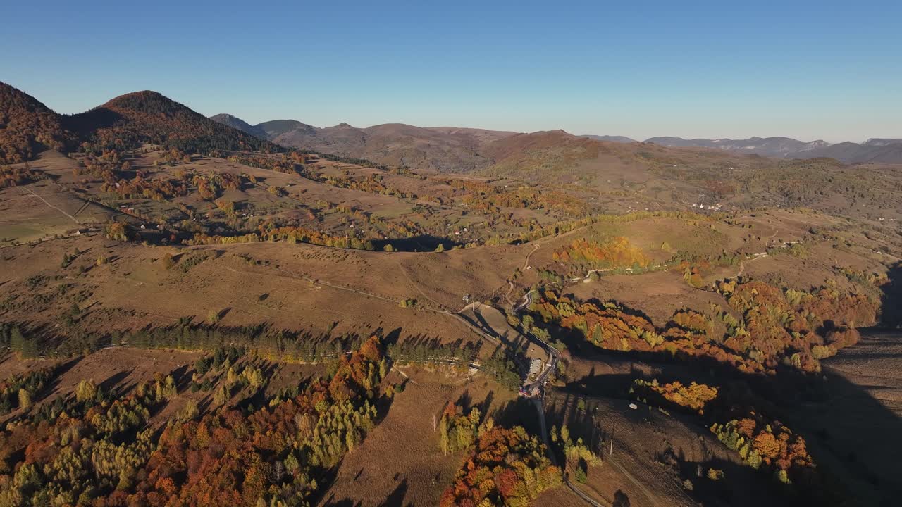 Experience the breathtaking beauty of the Apuseni Mountains during autumn, with vibrant fall colors and spectacular aerial views of this natural wonder