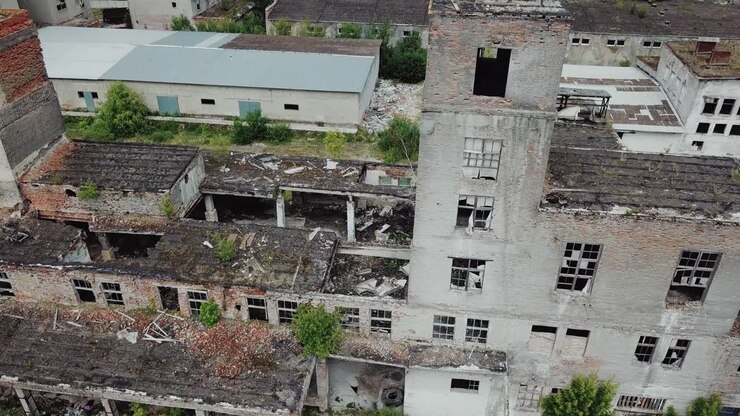 Ruins of an old factory. Old industrial building for demolition. Aerial view