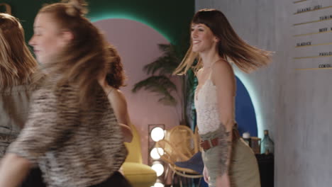 two women dancing in a room