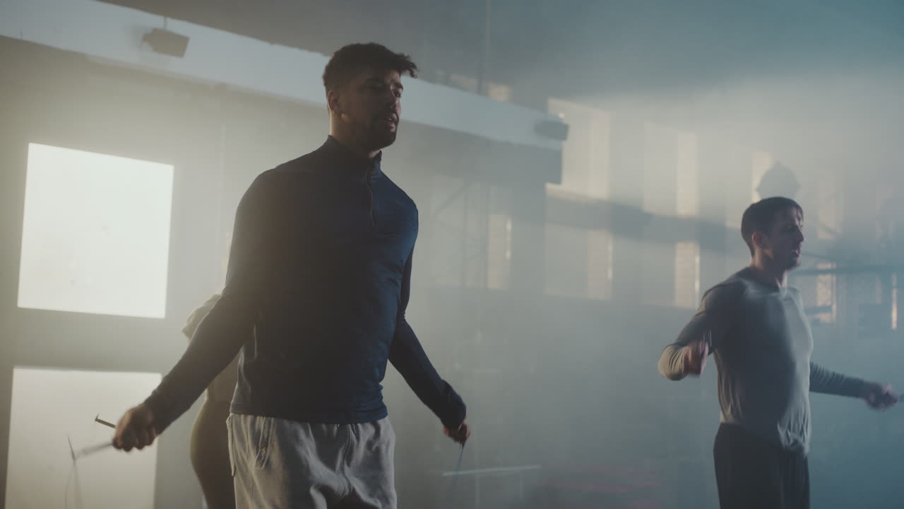 People Jumping Rope in Gym