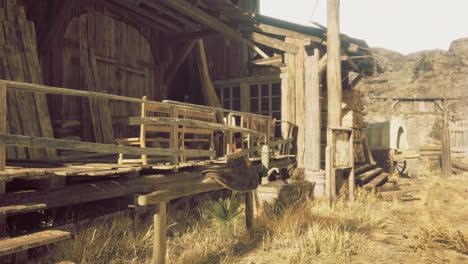 old wooden structure with rustic furniture in dry landscape