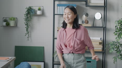 woman cleaning her living room