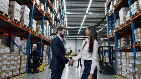 business deal in warehouse
