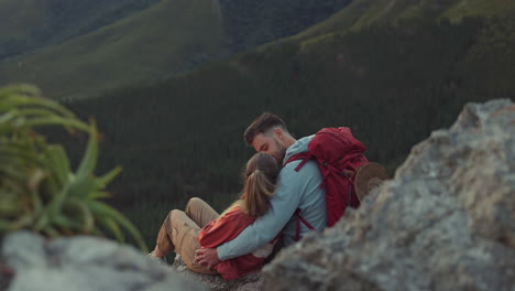 Mountain,-sunset-or-couple-kiss-to-relax-outdoors