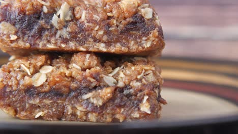 close up of stacked oatmeal bars on a plate