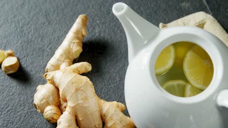 Teapot-with-lemon-and-ginger-4k