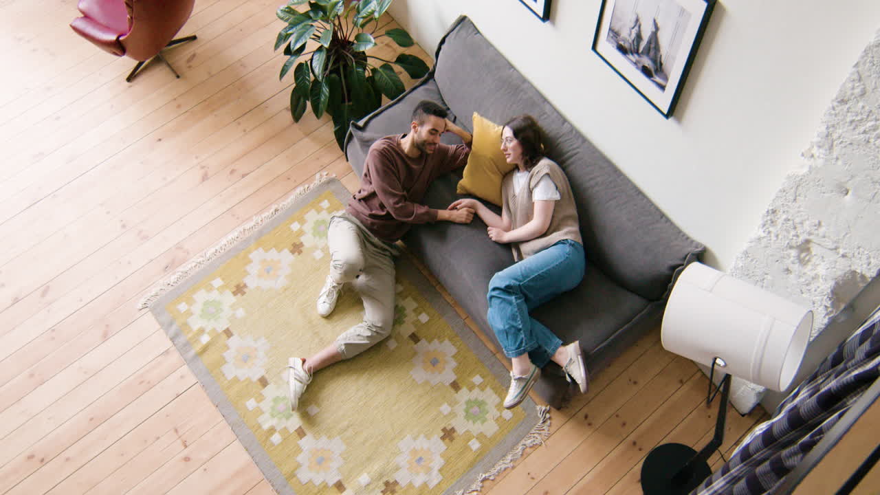 Young lovers at home