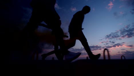 hipster friends holding smoke bombs and running after sunset